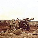 A 155mm gun section of the 2/12the co-located with us at Bu Dop.  They were cranking up to send some "willie pete" into the tree line. Arthur Fujii,  an old friend with whom I was drafted, went throught basic at Ft. Ord and AIT at Ft. Sill, is in front.